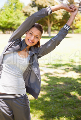 Woman doing overhead stretches