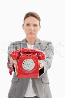 angry businesswoman holding a phone