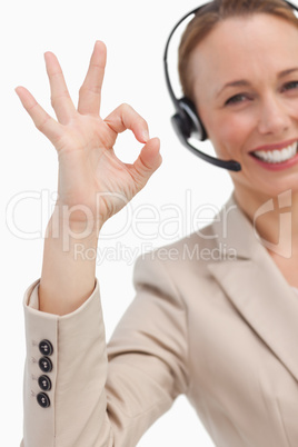 Approbation of a businesswoman with a headset