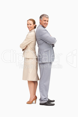 Portrait of smiling business people back to back