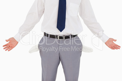 Man showing his empty pockets and hands