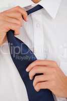 Man undoing his tie