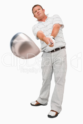 Golfer with his club