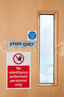 Staff only signs at laboratory