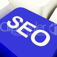 SEO Computer Key In Blue Showing Internet Marketing And Optimiza