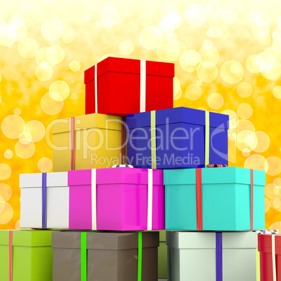 Multicolored Giftboxes  With Yellow Bokeh Background As Presents