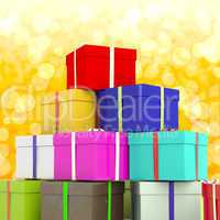 Multicolored Giftboxes  With Yellow Bokeh Background As Presents