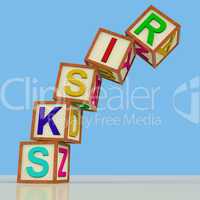 Blocks Spelling Risks Falling Over As Symbol for Danger Or Chanc