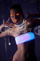 Beauty woman dance with glow make-up