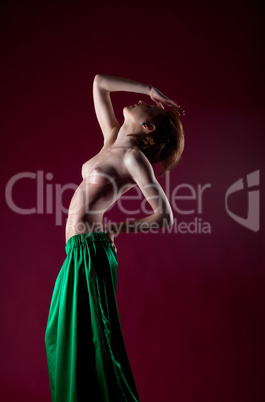 Beauty topless woman posing in green cloth