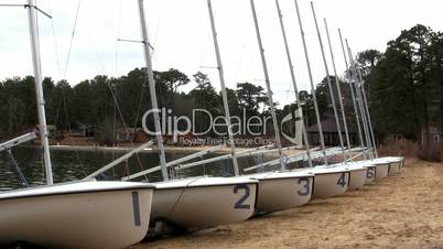 Sail boats lined up for rigging