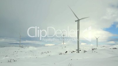 Windmills in arctic winter landscape