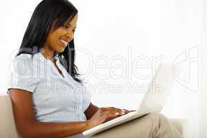 Attractive young woman using a laptop