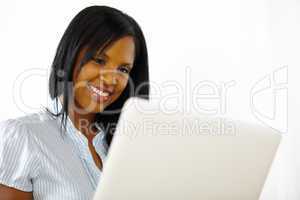 Pretty young woman using a laptop