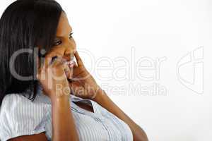 Beautiful young woman talking on cell phone