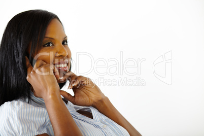 Beautiful young woman speaking on cell phone