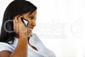 Cute young woman on cellphone