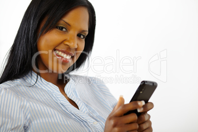 Attractive young woman using a mobile