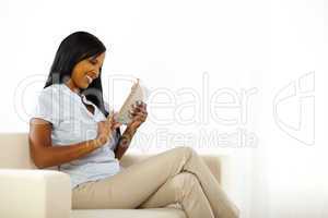 Pretty young lady using a tablet PC
