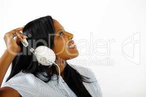 Lovely young female listening to music