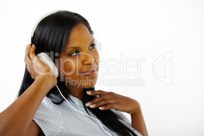 Happy relaxed young lady listening to music