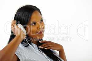 Happy relaxed young lady listening to music