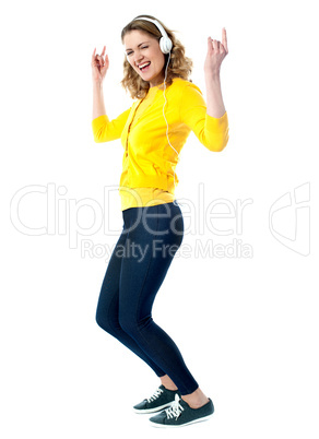 Hip hop woman with headphones enjoying music
