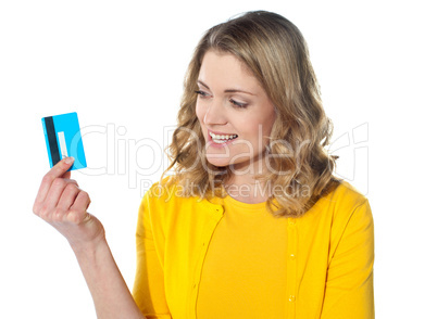 Attractive female holding her credit card
