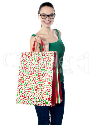 Image of glamorous shopping girl holding bags
