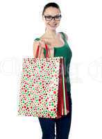 Image of glamorous shopping girl holding bags