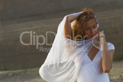 Young woman with white scarf