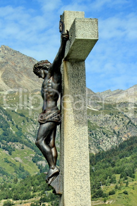 Jesus cross next to the mountain