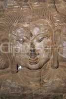 Wall and face of Buddha