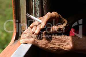 Hand with cigarete