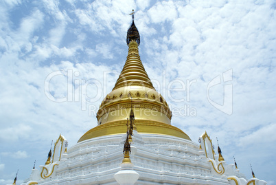 White stupa with golden top