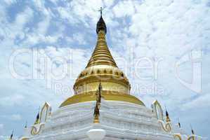 White stupa with golden top