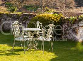 Garden table and chairs on lawn