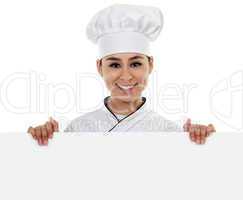 Female Chef with Sign