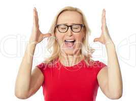 Frustrated aged woman shouting