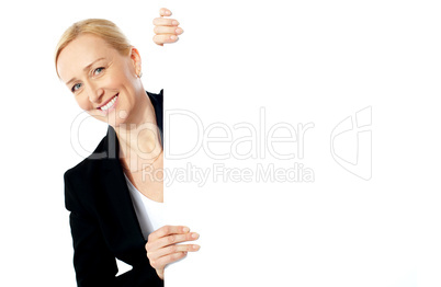 Portrait of a businesswoman holding clipbaord