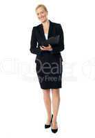 Full length view of an aged female executive