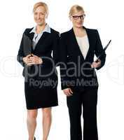 Two businesswoman over white background