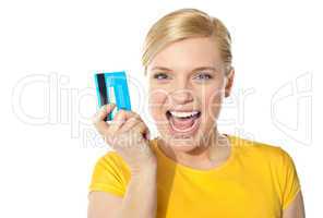 Blond sales girl posing with credit card