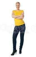 Stylish teenager posing with crossed arms