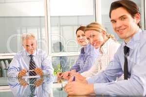 businessmen and businesswomen during a working meeting