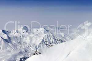 Snowy mountains in haze