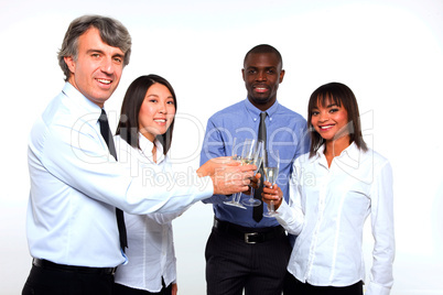 multi-ethnic team toasting