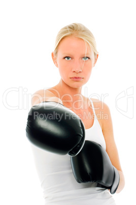 portrait of a young caucasian woman who does kick boxing with bo