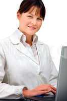 portrait of a young caucasian woman doctor with laptop