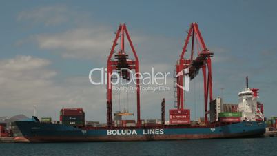 huge container vessel unloads cargo